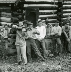 Students at Forestry Camp Participate in Rifle Contest, with NC State professor George K. Slocum