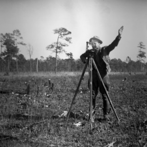 Charlie Pettit surveying in Hofmann Forest