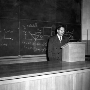 Dr. John W. Cell teaching at chalkboard