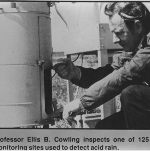 Professor Ellis B. Cowling inspecting acid rain monitoring sites