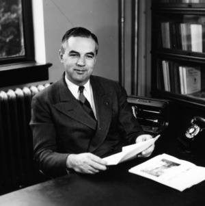 Ralph W. Cummings at desk
