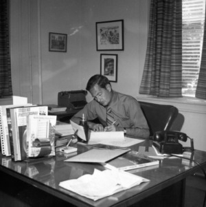 Joe Hancock at desk