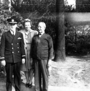 Louis H. Harris with others
