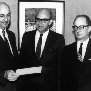 Joseph H. Sherrill presenting check to B. B. Parker and C. William Hart