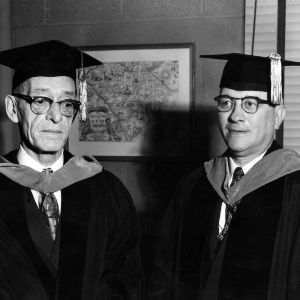 J. Harold Lampe and other in graduation robes