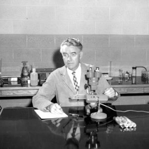 Charles J. Nusbaum at work in lab