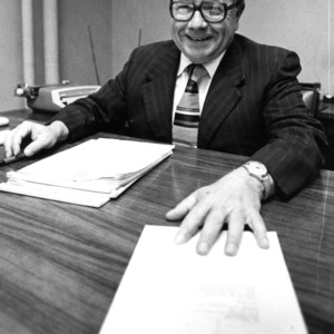 Rudolph Pate at desk