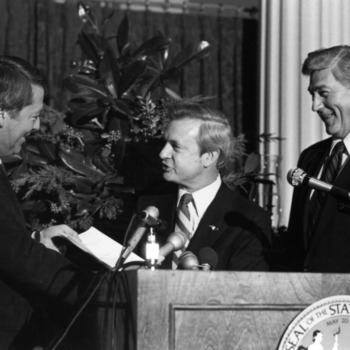 Jack P. Jordan, Bruce Poulton, and James Hunt at land acquisition event