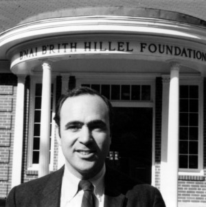 Jewish chaplain H. A. Rabinowitz in front of Enai Brith Hillel Foundation building