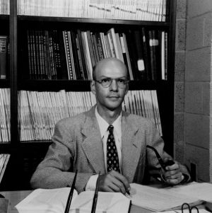 Dr. E. M. Schoenborn at desk