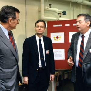 President George Bush with James Cook and Jan Schetzina in Schetzina's lab