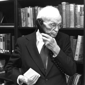 Edwin Gill on telephone