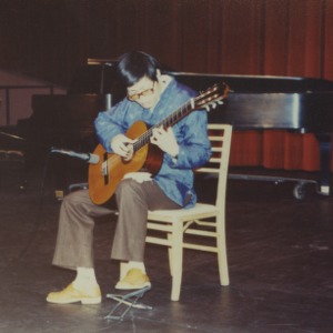 Guitarist performing at event