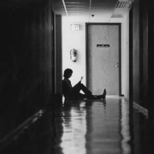 Student studying in hallway