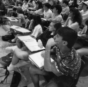 Students attending class with stadium seating