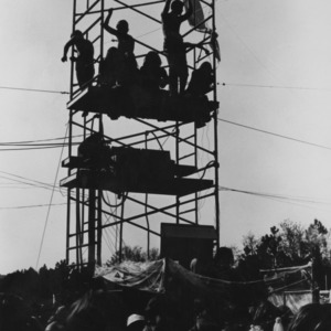 Students on scaffolding at event