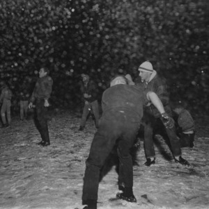 Students playing in the snow