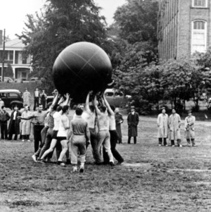 Students playing with giant Pushball