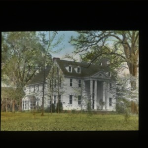 Plantation type house with trees