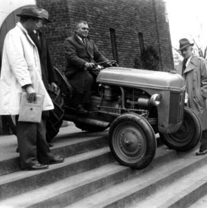 Four men and a tractor