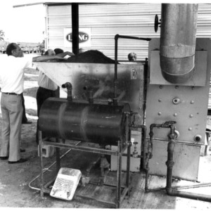 Bill Johnson firing wood boiler with chips - automatic stoker