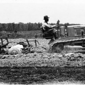 Tractor and plowing disc