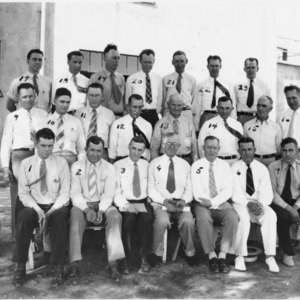 J. C. Ferguson (front row, far right, number 7) in group picture - Cotton Gin Conference, Stoneville Miss. 1937