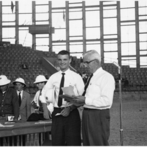 J. C. Ferguson and others with hardhats