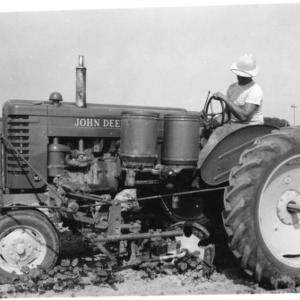 Man on John Deere tractor