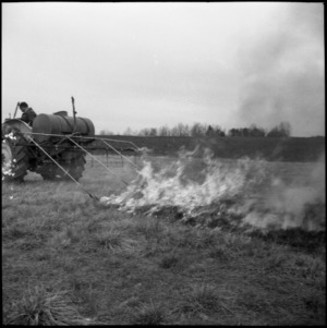 Agricultural machinery and fire in field