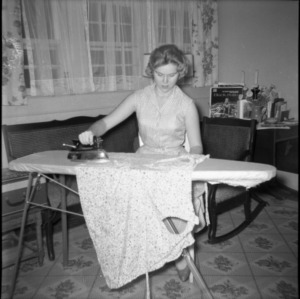 Woman ironing at 4-H electric project