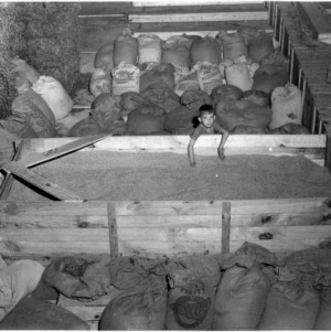 Child with grain container