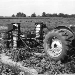 Ford Tractor Pulling Agricultural Machinery for Crop Harvesting