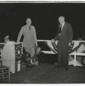 Eisenhower and other on stage
