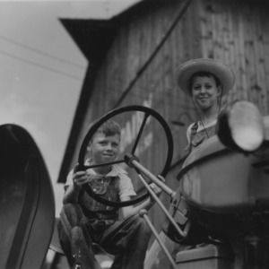 Boys on tractor