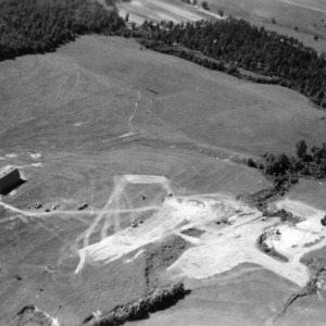 Aerial view of dairy farm before construction of dam