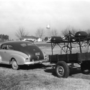 Sprayer machinery attached to car