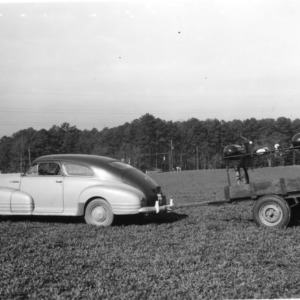 Sprayer machinery attached to car