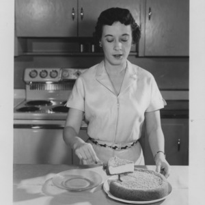 Rita Dubois baking a cheesecake