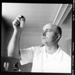 Dr. J. N. Sasser at work in lab