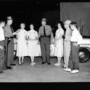 4-H Club Week: "Drive With Care" Class; Left to Right: Bowman, Boykin, Son, Lucile Allred, Pender County; Pfc. Dave Mount, High Point; Mary Ramsey, Pender County; J. P. Price; [illegible] Dagerhart, Alexander County