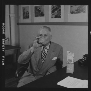 Coach Everett N. Case Drinking Milk