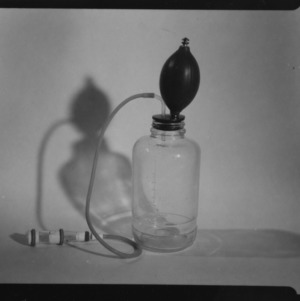 Bottle and suction bulb, lab equipment