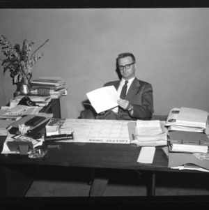 Jimmy Erdall at Desk in College Union