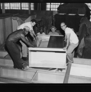 Unloading furniture for new dormitories