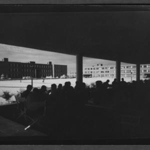 Campus: Williams and Gardner Halls seen from College Union Terrace, Students at tables in foreground