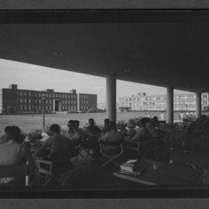 Campus: Williams and Gardner Halls seen from College Union Terrace, Students at tables in foreground