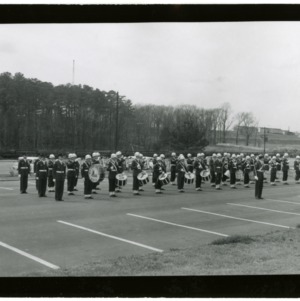 Drum and Bugle Corps and Pershing Rifle Squad saluting foreign officers