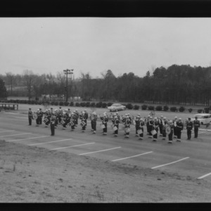 Drum and Bugle Corps and Pershing Rifle Squad saluting foreign officers