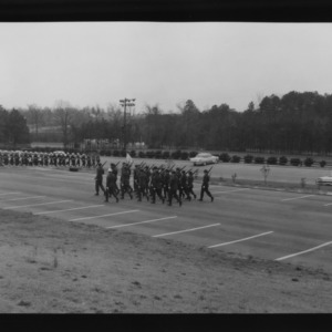 Drum and Bugle Corps and Pershing Rifle Squad saluting foreign officers